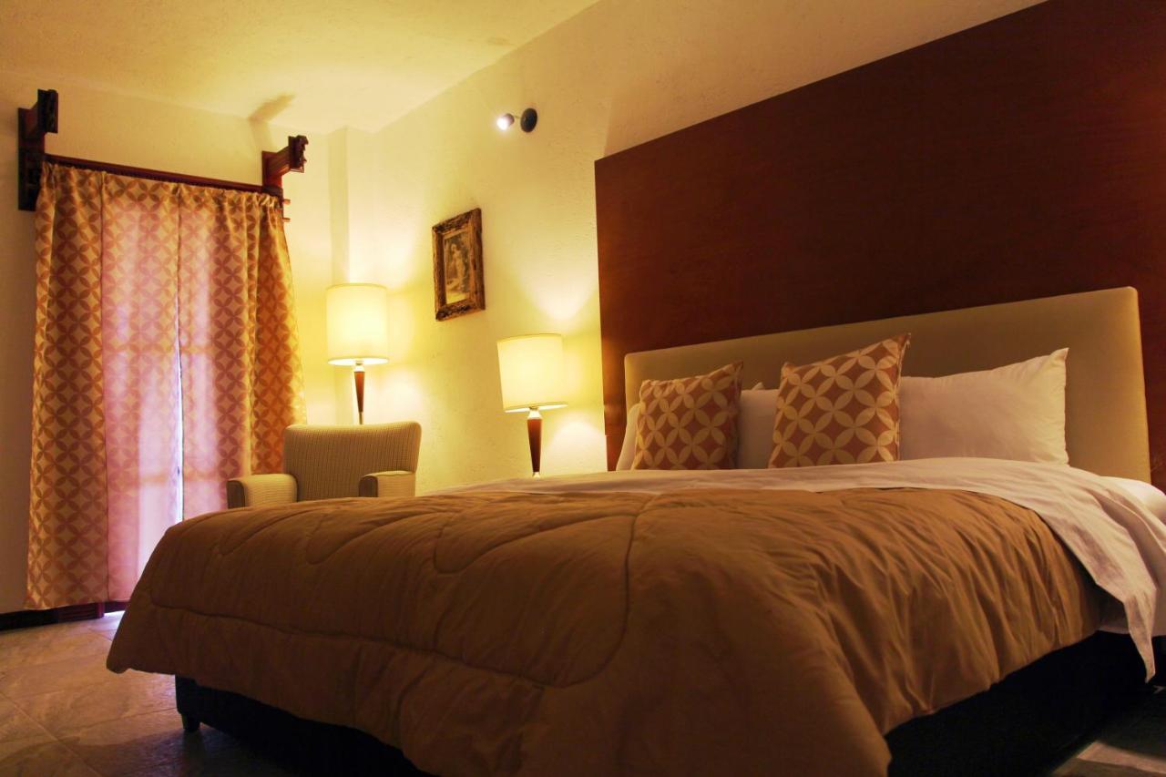 צ'ולולה Hotel El Cristo מראה חיצוני תמונה